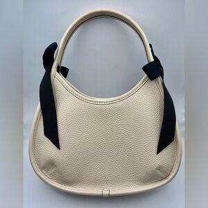 Elegant Cream Shoulder Bag with Black Accents